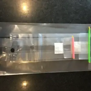 Mushroom grow bags sealed with colorful Mushroom Bag Sealer Sticks, ensuring an airtight closure for fruiting and cultivation.