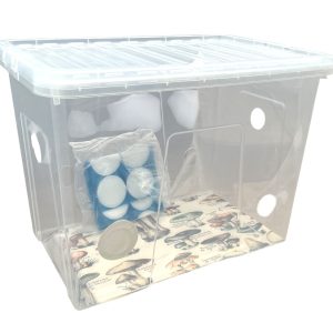 A side-angle view of the best monotub setup for mushrooms, featuring filter patches and pre-drilled holes for controlled air exchange and humidity regulation.