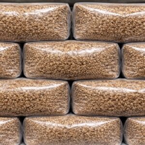 Sterilised rye grain spawn bags 1.5kg stacked for wholesale supply in the UK, professional mushroom cultivation grain bags ready for inoculation