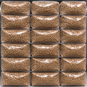 1kg sterilised rye grain spawn bags stacked for wholesale mushroom cultivation supply in the UK ready for inoculation