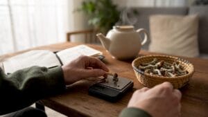 Person weighing psilocybin mushrooms on scale