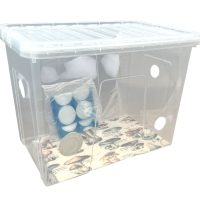 A side-angle view of the best monotub setup for mushrooms, featuring filter patches and pre-drilled holes for controlled air exchange and humidity regulation.