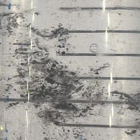 Magic mushrooms spores syringes of a 20ml double-density golden teacher Spore syringes uk . The spore syringe contains a clear fluid with dense clusters of dark spore particles suspended throughout, faintly illuminated by overhead lighting. Horizontal measurement markings are visible on the Spore syringes uk surface.